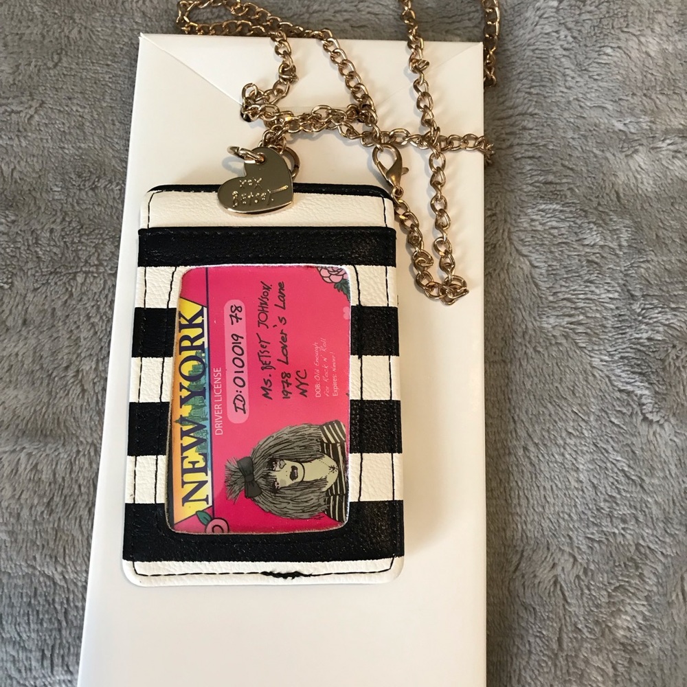 Betsy Johnson ID holder on a chain